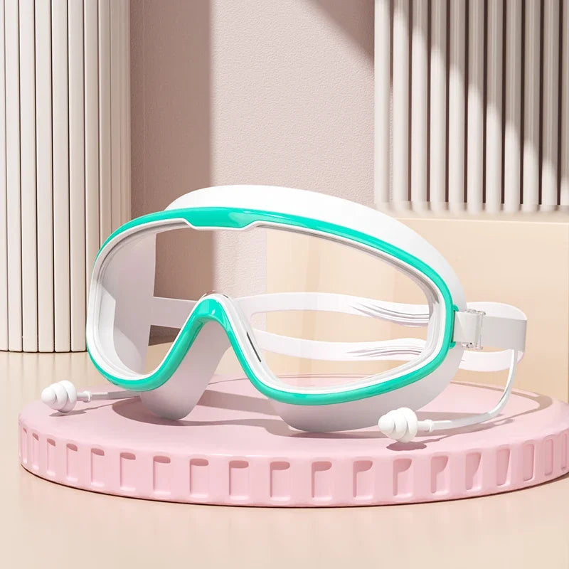 Anti-Fog Wide View Swimming Goggles – UV Protection & Earplugs Included