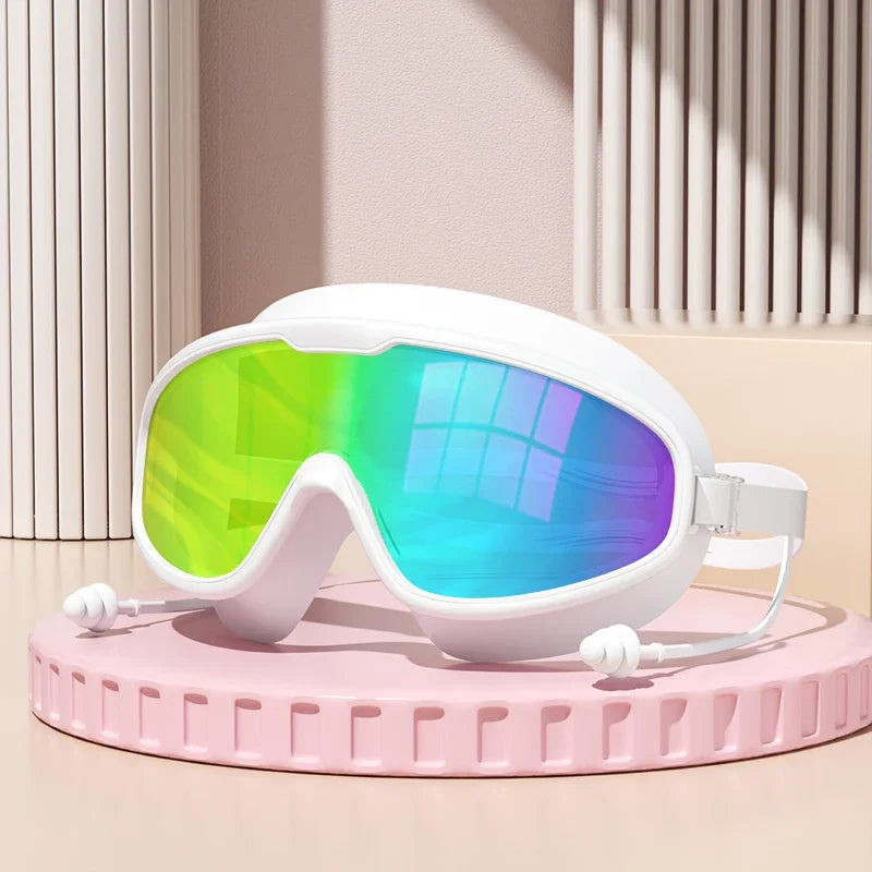 Anti-Fog Wide View Swimming Goggles – UV Protection & Earplugs Included