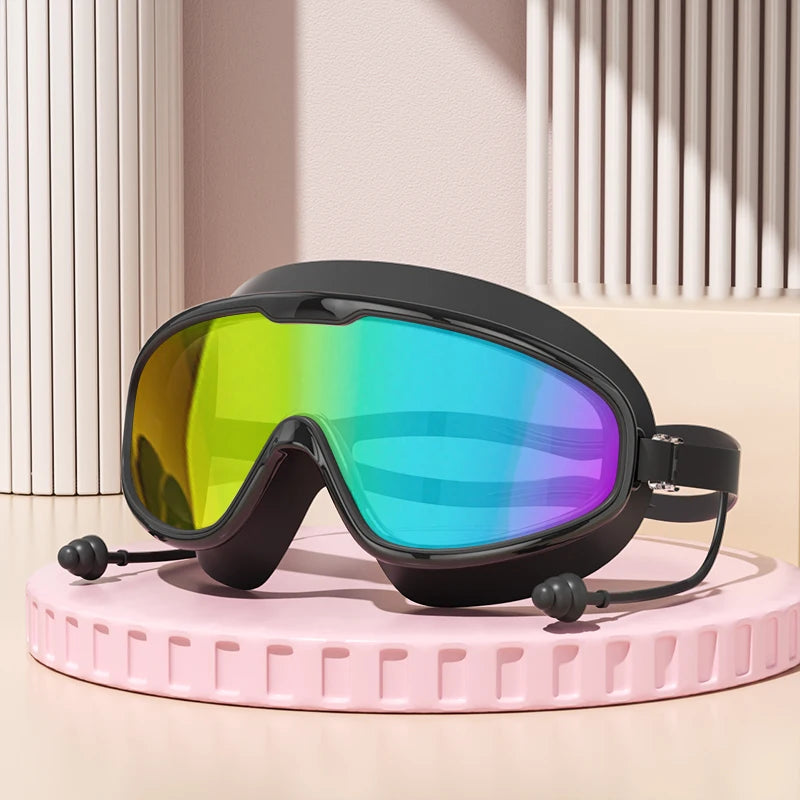 Anti-Fog Wide View Swimming Goggles – UV Protection & Earplugs Included