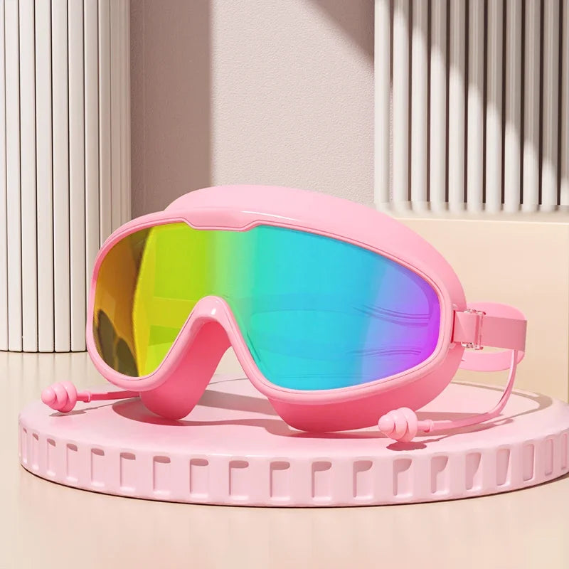 Anti-Fog Wide View Swimming Goggles – UV Protection & Earplugs Included